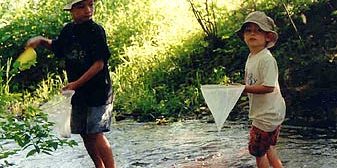 Vermont boys out fishing in river